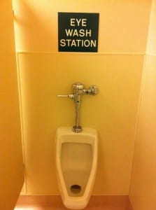 Urinal eye wash